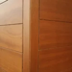 Close-up of modern wooden wall panels showcasing clean lines and texture.