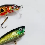 Bright and detailed fishing lures on a clean white surface.